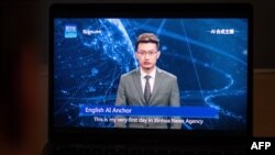 This photo illustration shows a man watching an artificial intelligence (AI) news anchor from a state-controlled news broadcaster, on his computer in Beijing, Nov. 9, 2018.