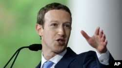 FILE - Facebook CEO Mark Zuckerberg speaks at Harvard University in Cambridge, Mass., May 25, 2017.
