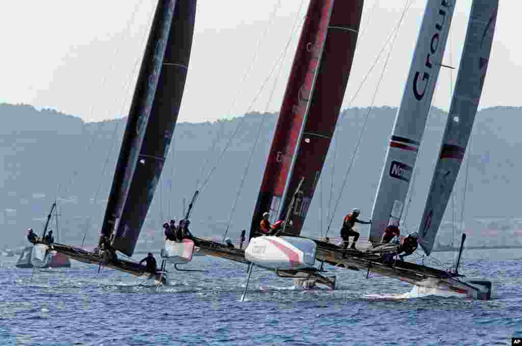 (R to L) Groupama Team France, Emirates Team New Zealand and Softbank Team Japan compete during the second day of the Louis Vuitton America's Cup World series, offshore Toulon, France.