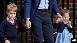 Britain's Prince William arrives with Prince George and Princess Charlotte back to the Lindo wing at St Mary's Hospital in London London, Monday, April 23, 2018. The Duchess of Cambridge gave birth Monday to a healthy baby boy — a third child for Kate and