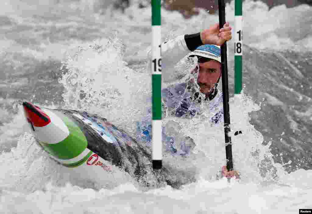 Italy's Giovanni De Gennaro competes during the Men's Kayak (K1) final of 2021 Canoe Slalom European Championships in Ivrea, Italy, May 8, 2021.