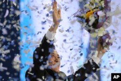 South Korea's opposition Democratic Party leader Moon Jae-in celebrates after winning the nomination as the party's presidential candidate during a party's presidential primary in Seoul, South Korea, April 3, 2017.