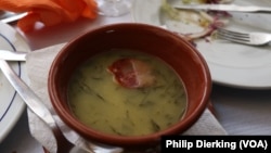 Caldo Verde, a Portuguese soup made from potatoes, vegetables and sausage