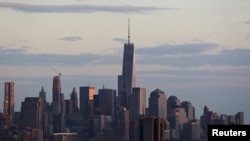 A passenger boat in front of One World Trade Center in Lower Manhattan in New York, April 17, 2015.