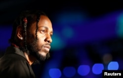 Musician Kendrick Lamar arrives at the 2017 MTV Video Music Awards in Inglewood, California, U.S., August 27, 2017. REUTERS