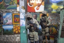 Soldiers patrol in Petion Ville, the neighborhood where the late Haitian President Jovenel Moise lived in Port-au-Prince, Haiti, Wednesday, July 7, 2021.
