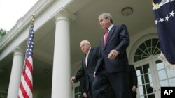 President Bush and Vice President Cheney walk to the Rose Garden for the swearing-in of Rob Portman, former congressman and U.S. trade representative, as director of the president's Office of Management and Budget. (By Pablo Martinez Monsivais, AP)