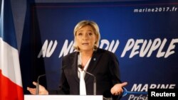 Marine Le Pen, French far-right National Front (FN) party president, member of European Parliament and candidate for French 2017 presidential election, speaks to the media in Paris, France, Jan. 4, 2017.
