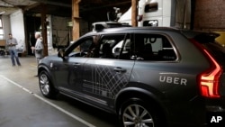 In this file photo, an Uber driverless car is shown in a garage in San Francisco, Dec. 13, 2016.