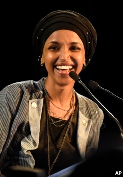 Democrat Ilhan Omar speaks after winning in Minnesota's 5th Congressional District race, on Nov. 6, 2018, in St. Paul, Minnesota. (AP Photo/Hannah Foslien)