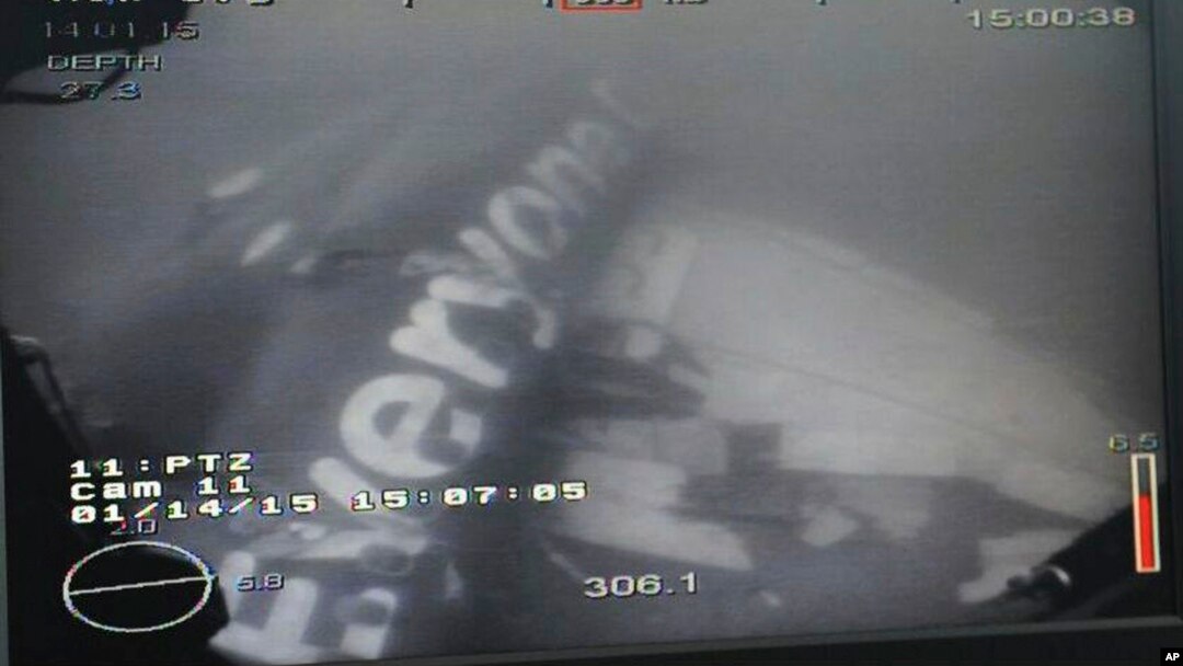 This undated underwater photo taken by a Remotely Operated Vehicle (ROV) and released by the Singapore Ministry of Defence (MINDEF) shows the wreckage of AirAsia Flight QZ 8501 lying on the sea floor in the Java Sea. 