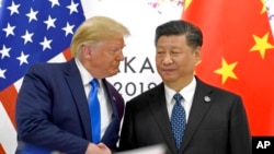 资料照片：美国总统特朗普和中国国家主席习近平在日本大阪G-20峰会期间会晤。(2019年6月29日)