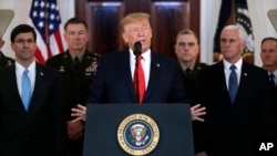 President Donald Trump addresses the nation from the White House on the ballistic missile strike that Iran launched against Iraqi air bases housing U.S. troops, Wednesday, Jan. 8, 2020. (AP Photo/ Evan Vucci)