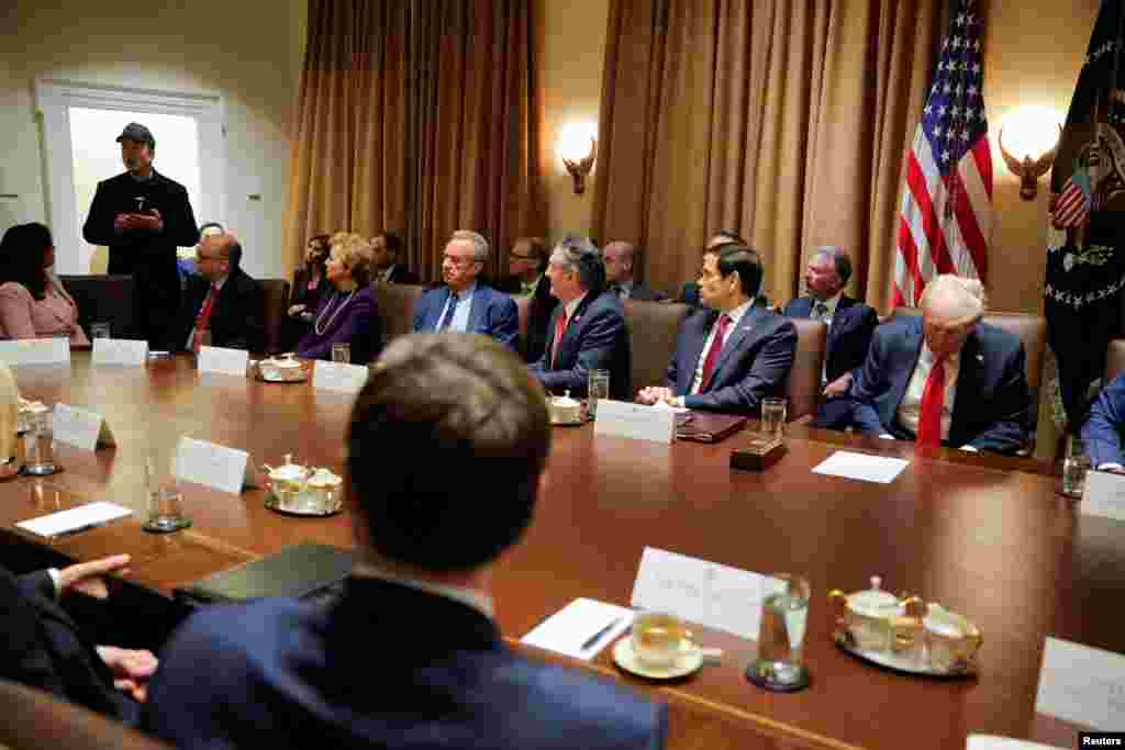 Elon Musk speaks as U.S. President Donald Trump hosts his first Cabinet meeting at the White House in Washington.