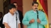 Los presidentes de Bolivia, Evo Morales, y de Venezuela, Nicolás Maduro, en un encuentro en Caracas el domingo 15 de abril.