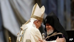 Pope Francis, left, and Armenia's Orthodox Church leader Karekin II, during a service April 12 at the Vatican. (AP Photo/Gregorio Borgia)