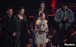 FILE - Taylor Swift accepts the award for Video of the Year for “All Too Well” at the 2022 MTV Video Music Awards at the Prudential Center in Newark, New Jersey, U.S., August 28, 2022. (REUTERS/Brendan McDermid)
