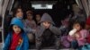 Officials Debate Wave of Migrants Arriving at US Border