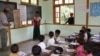 Students at the Nan Ouw School in Burma recite the Burmese and English alphabet for "Build a School in Burma" founder Bob Cornwell. (Courtesy Build a School in Burma) 