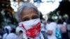 Venezolanos opositores al gobierno de Nicolás Maduro participaron de una vigilia, el domingo 1 de diciembre, para protestar, explicaron, por el encarcelamiento injusto de personas inocentes.
