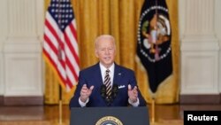 美國總統拜登在白宮東廳舉行正式記者會。(2022年1月19日)