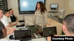 Souzy Guirguis teaches military students in Egyptian dialect at the Defense Language Institute Foreign Language Center (Courtesy - DLI).