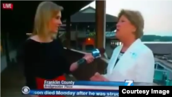 Reporter Alison Parker, left, conducting a live interview moments before she was shot dead, Aug. 26, 2015.