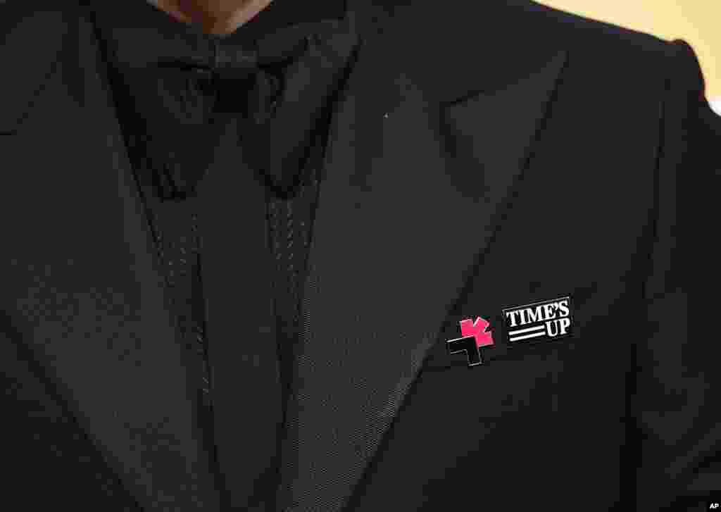 Edgar Ramirez wear's a Time's Up pin arrives at the 75th annual Golden Globe Awards at the Beverly Hilton Hotel on Sunday, Jan. 7, 2018, in Beverly Hills, Calif. (Photo by Jordan Strauss/Invision/AP)