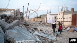 Wêneyek ji wanîyên hilweşî li bajarê Serêkanîyê.
