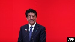 FILE - Japan's Prime Minister Shinzo Abe delivers a speech in Tokyo, July 24, 2019. 