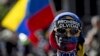 Opositores al gobierno de Nicolás Maduro protestaron durante el tercer aniversario de la represión contra una marcha de jóvenes que desató una ola de protestas en 2014.