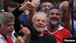 Former Brazilian President Luiz Inacio Lula da Silva gestures after being released from prison, in Sao Bernardo do Campo, Brazil, Nov. 9, 2019. 