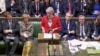 La primera ministra británica, Theresa May, habla después de conocer los resultados de la votación del acuerdo Brexit en el Parlamento en Londres, Gran Bretaña, el 12 de marzo de 2019.