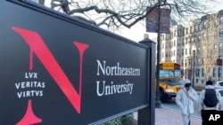 In this Jan. 31, 2019 photo, students walk on the Northeastern University campus in Boston. (AP Photo)