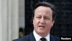 British Prime Minister David Cameron moved to end a revolt over European Union membership in his ruling Conservative party saying all his ministers backed his strategy on the issue despite two expressing more sceptical views than his own, (File photo).