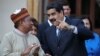 El presidente de Venezuela, Nicolás Maduro (derecha) recibió en Caracas al secretario general de la OPEP, Mohammed Barkindo, el 16 de noviembre, de 2016.