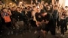 香港民主派支持者庆祝亲北京的立法会议员何君尧败选