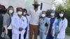In Virus Crisis, People Find Purpose in Helping Others