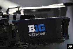 FILE - A network television camera is photographed before an NCAA college football game Oct. 22, 2022, in College Park, Md. (AP Photo/Gail Burton, File)